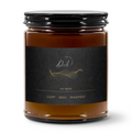 Candle jar with a black label on a white background
